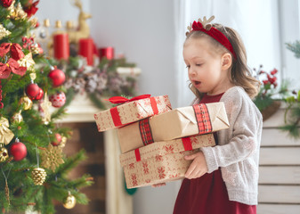 girl with Christmas presents