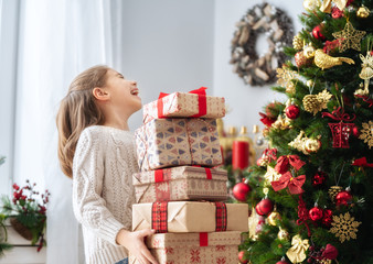 girl with Christmas presents