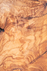 Natural Italian olive wood cutting board like abstract art texture, backboard