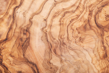 Natural Italian olive wood cutting board like abstract art texture, backboard