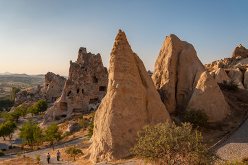 A detail from the structure of Cappadocia. Impressive fairy chimneys of sandstone in the canyon near Cavusin village, Cappadocia, Nevsehir Province in the Central Anatolia Region of Turkey. Clear sky.