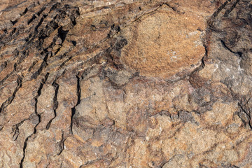 Orange and brown toned rock as a nature background