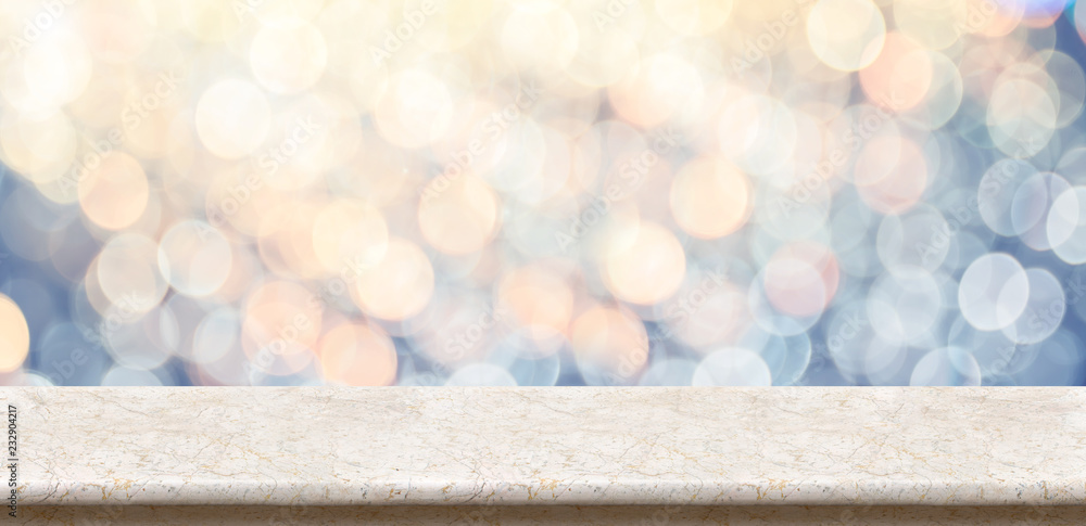 Aufkleber empty marble glossy table top with blur sparkling soft pastel blue and orange bokeh abstract backgro
