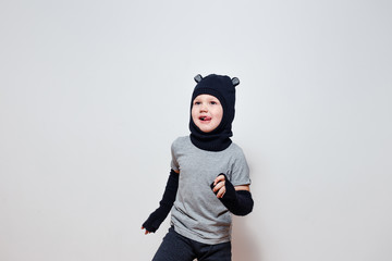 gay boy in a gray shirt dancing