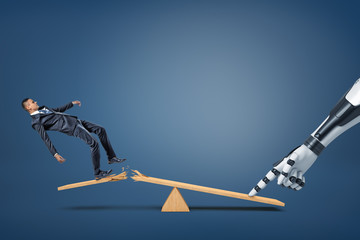 A small businessman falls from a broken plank of a see-saw when a robotic arm presses on its another side.