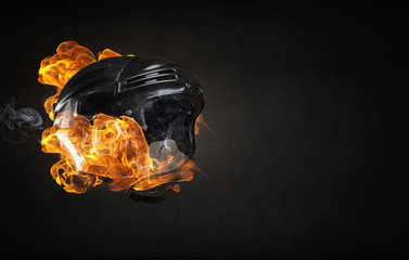 Obraz na płótnie Canvas Burning sport helmet
