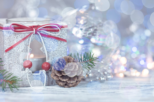 christmas decorations against blurred lights. winter holidays concept image