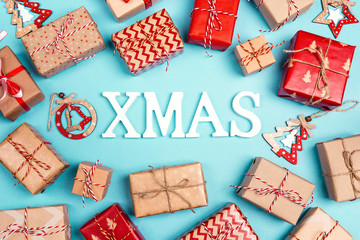 Christmas background with many gift boxes on blue. © WindyNight