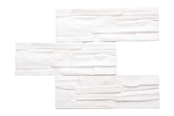 Gypsum decorative white bricks for finishing the walls after repair. Minimalist style. Work of the...