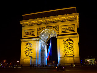 Fototapeta na wymiar The arc de Triomphe at night in the Place de Etoille, Paris