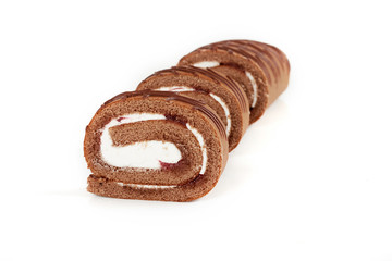 Chocolate biscuit roll cake isolated on white background.