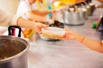 The Society of Sharing Food to Homeless and the Poorest: The Concept of Feeding