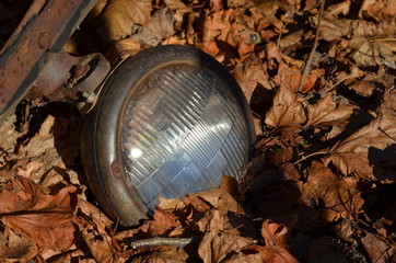 headlamp closeup, glass, autumn