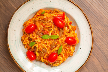 pasta with tomato sauce and basil