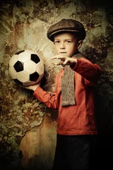 Foto op Plexiglas young boy with football © Andrey Kiselev