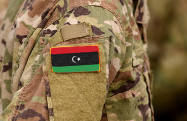 Libya flag on soldiers arm. Libyan army (collage)