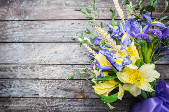 Bouquet of yellow and purple flowers