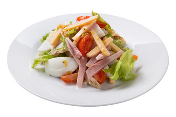 dietary salad with ham, egg and hard cheese, under mustard seed dressing, on a plate, isolate