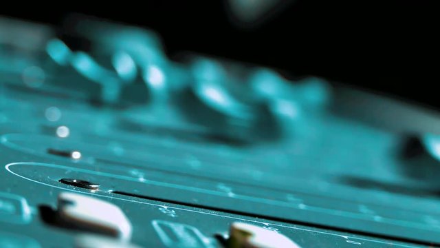 Mixing Music audio Concept Studio. music, technology people and equipment concept - happy man at mixing console in sound recording studio. Remote lifestyle MIDI control surface
