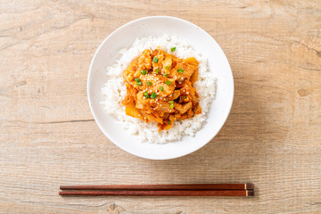stir-fried pork with kimchi on topped rice