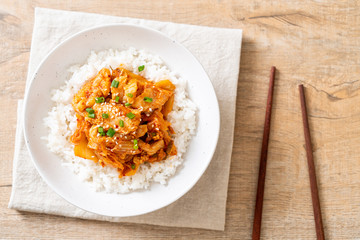 stir-fried pork with kimchi on topped rice