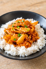 stir-fried pork with kimchi on topped rice