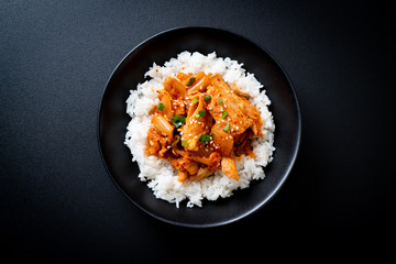 stir-fried pork with kimchi on topped rice