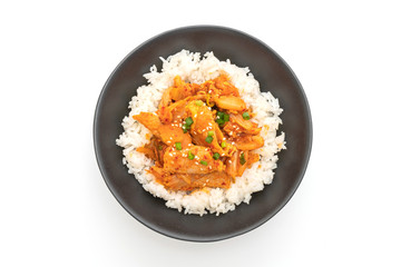 stir-fried pork with kimchi on topped rice isolated on white background
