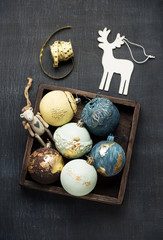 Christmas background with Christmas balls in a wooden box