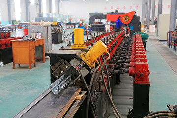 transmission device on the production line, in a solar equipment production workshop on december...