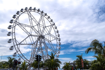 Obraz premium Blue sky with ferris wheel
