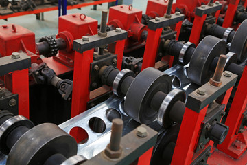 transmission device on the production line, in a solar equipment production workshop on december...