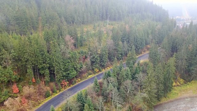 Bird's-eye view of the mountain road that runs along the Prut River. Carpathians. 
Ukraine