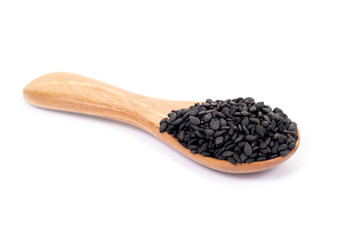 Close up black organic sesame on white background. Health food concept.