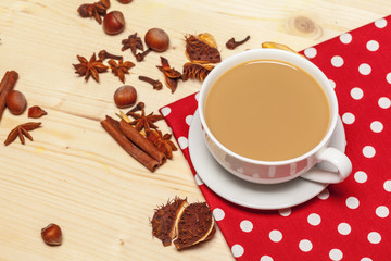 Coffee cup with saucer on a wooden background top view