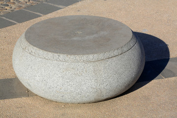Fototapeta na wymiar blocks of marble stone used as a seat on the ground