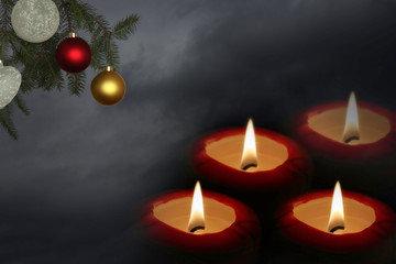 christmas candles on black background with copy space for text