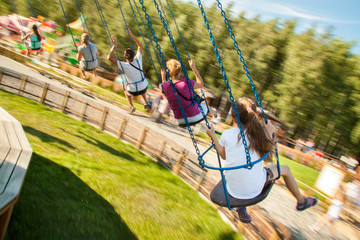 Children on chain carousel