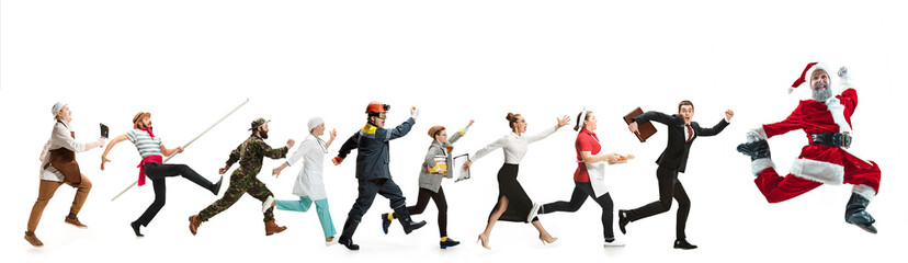 Collage of different professions. Group of men, women in uniform running at studio with Santa isolated on white. Full length of people with different occupations. Christmas and holiday concept