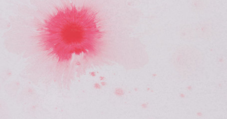pink ink drops spreads on white wet paper