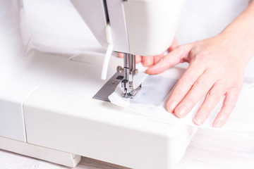 Woman working with sewing machine