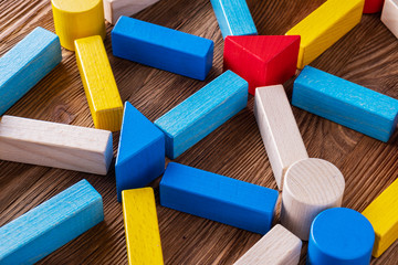 Abstract Background. Background with different colorful shapes wooden blocks . Geometric shapes in different colors. Concept of creative, logical thinking.
