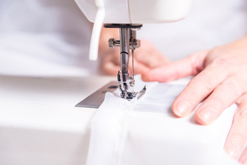 Woman working with sewing machine