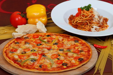 Obraz na płótnie Canvas pasta and pizza with tomato sauce