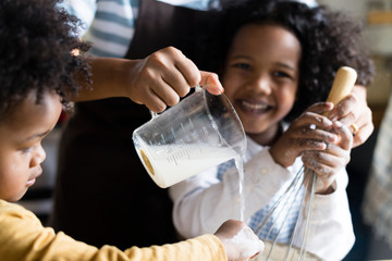 Brothers baking with their mum