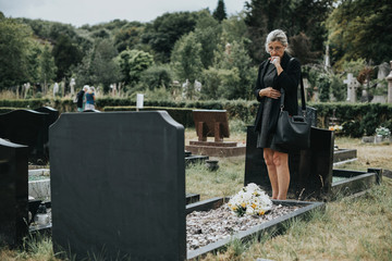 Old woman mourning her husband