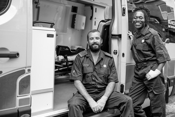 Paramedics team with an ambulance