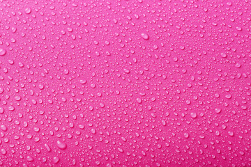 Drops of water on color background