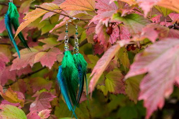 earrings of Handmade dream catcher with feathers threads and beads rope hanging