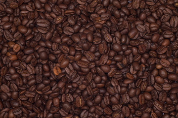 Top view on medium roasted coffee beans.